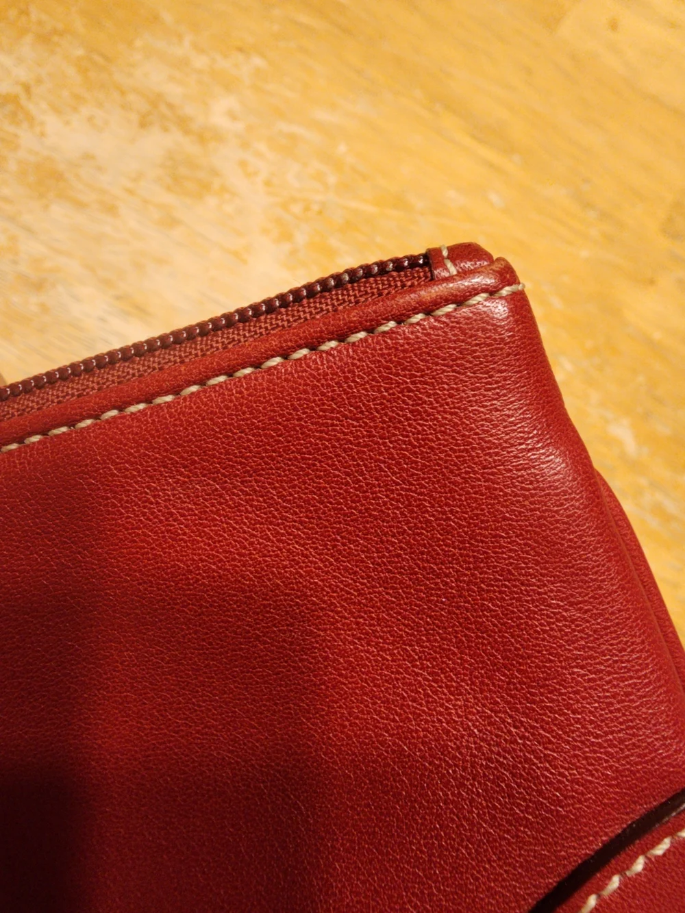 vintage Coach red leather Soho mini wristlet pouch featuring white contrast